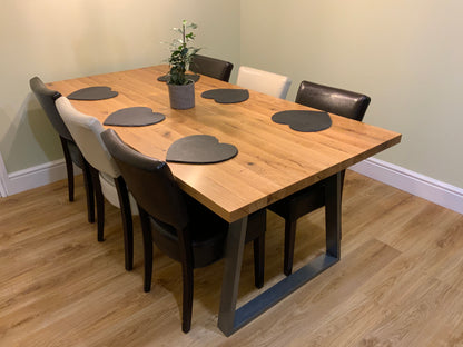 Solid oak dining table with industrial metal legs